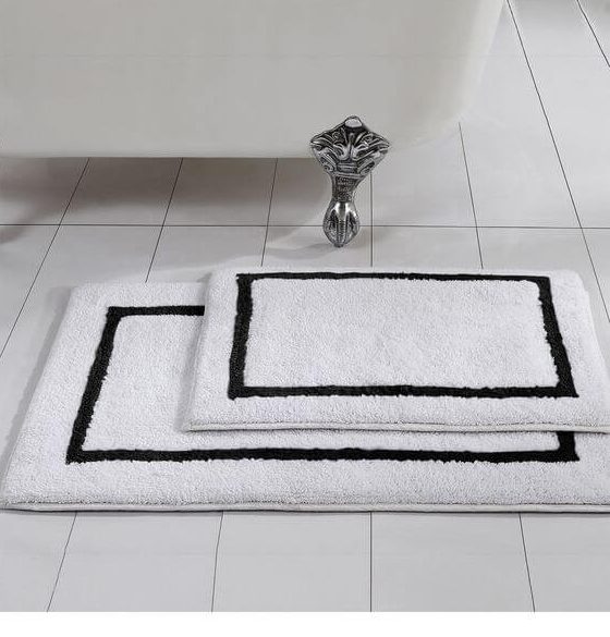 https://tandlinternational.com/wp-content/uploads/2021/06/black-and-white-bathroom-rug-e1623767392704.jpg