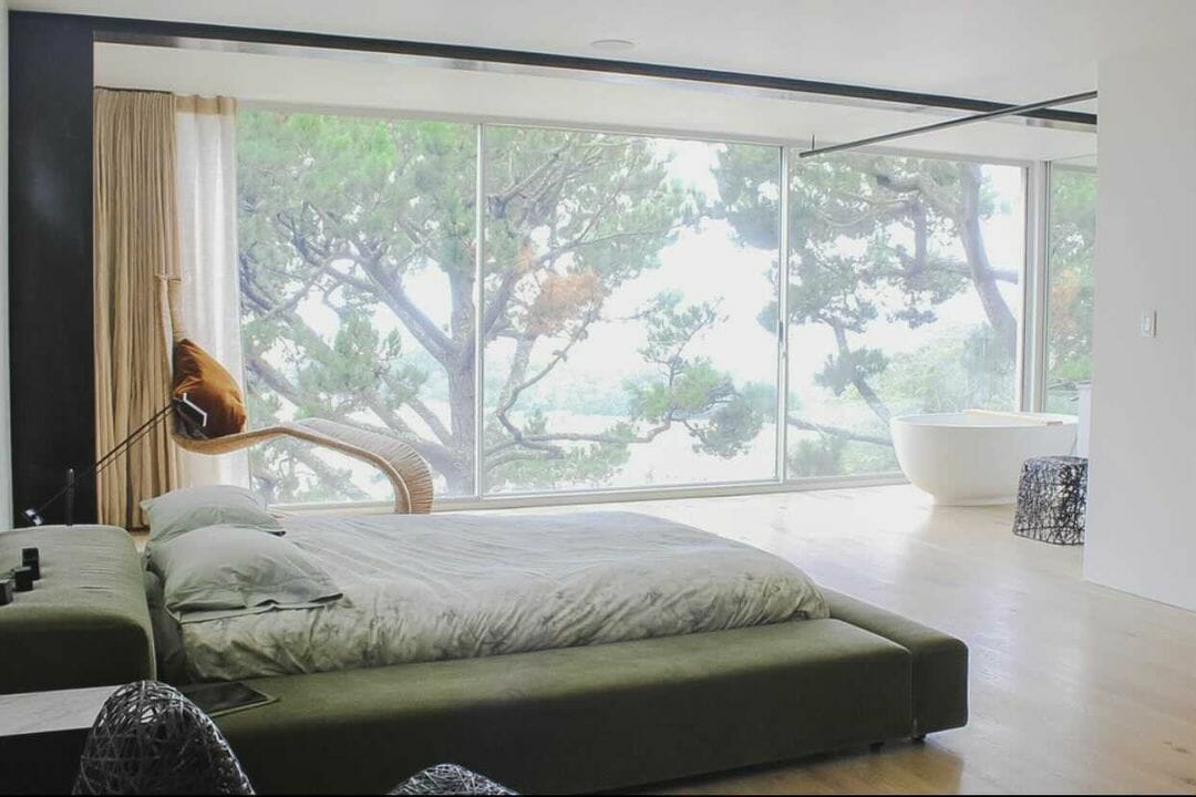 freestanding bathtub in a bedroom