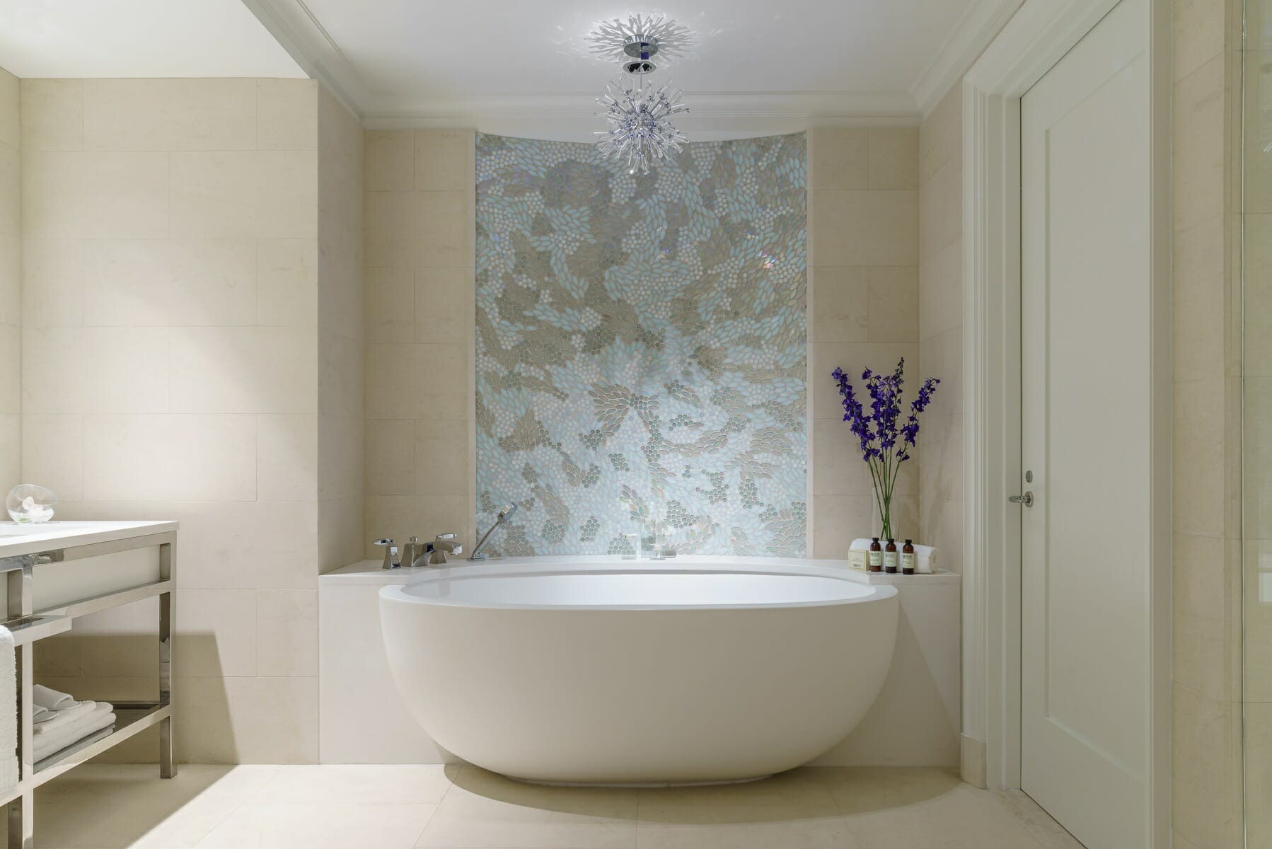 freestanding bathtub against a wall